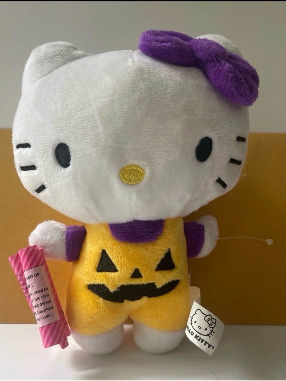 Hello Kitty Plush in Yellow Pumpkin Outfit with Purple Bow